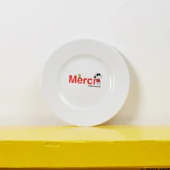 1859 ESSEASCREEN Peanuts X Merci|Assiettes Plates-Peanuts x Merci - Assiette à dessert - Logo Merci