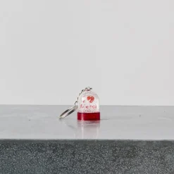 1197 LES PARISETTES Les Accessoires Merci-Porte-clefs boule à neige - Merci