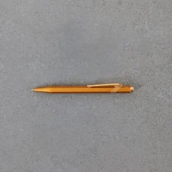 252 CARAN D ACHE Écriture-Stylo bille 849 COLORMAT-X - Gold - Caran d'Ache