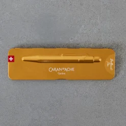 252 CARAN D ACHE Écriture-Stylo bille 849 COLORMAT-X - Gold - Caran d'Ache